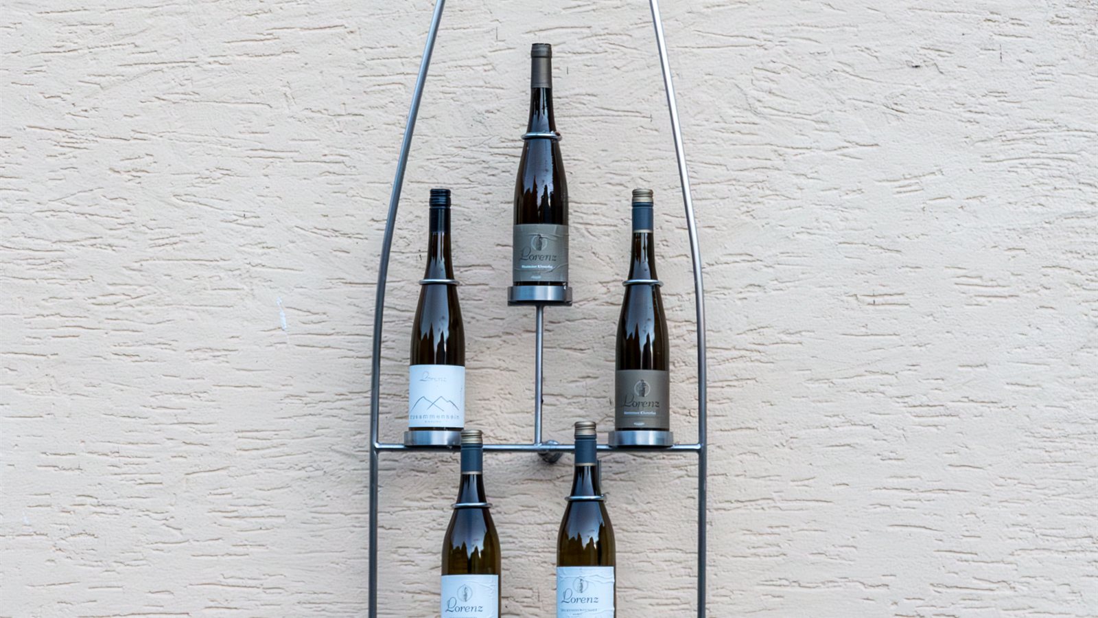 Rows of wine bottles resting on their sides