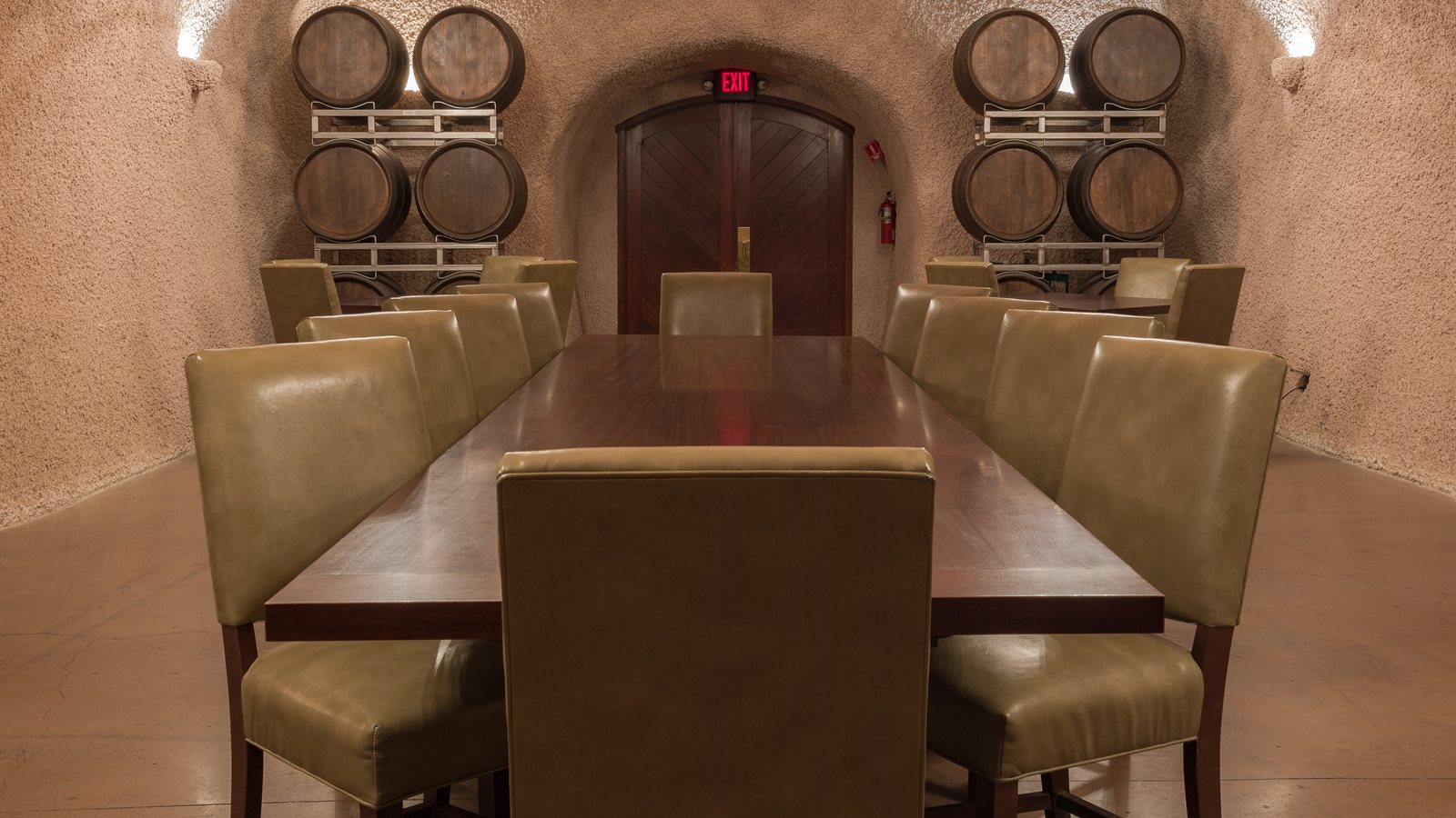 Tasting table set within a wine cave