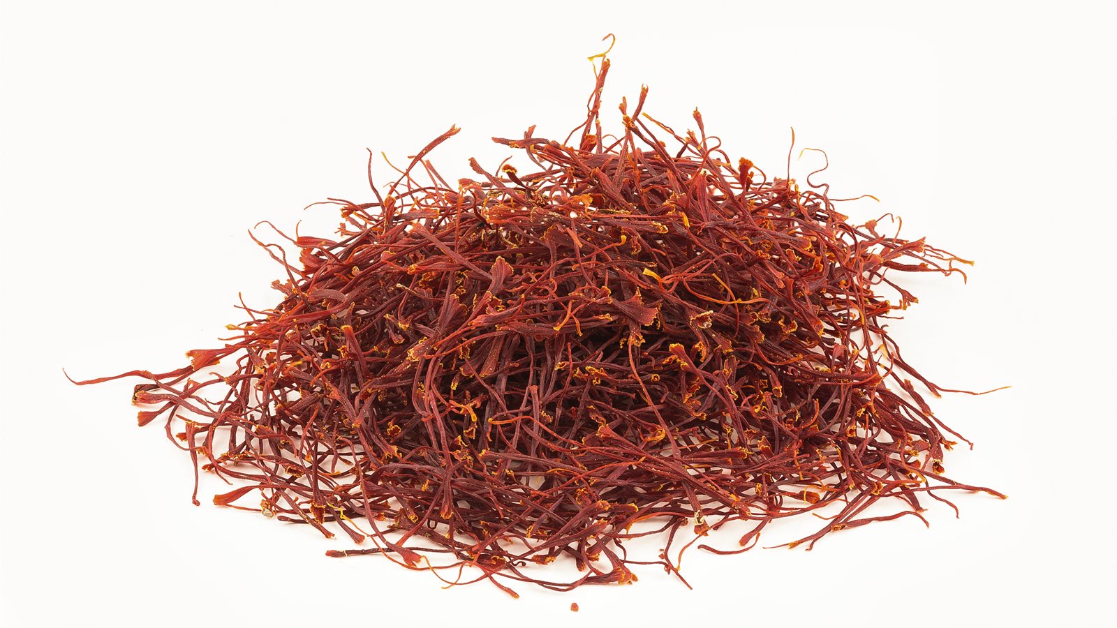 Small glass jars of dried saffron threads