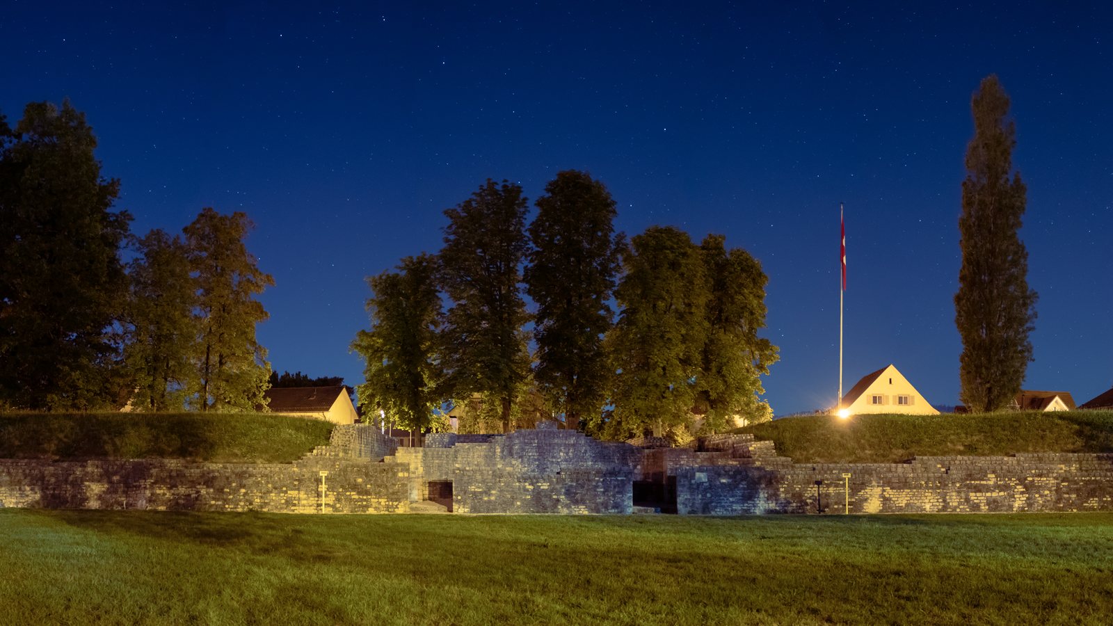 Roman amphitheatre lit at night