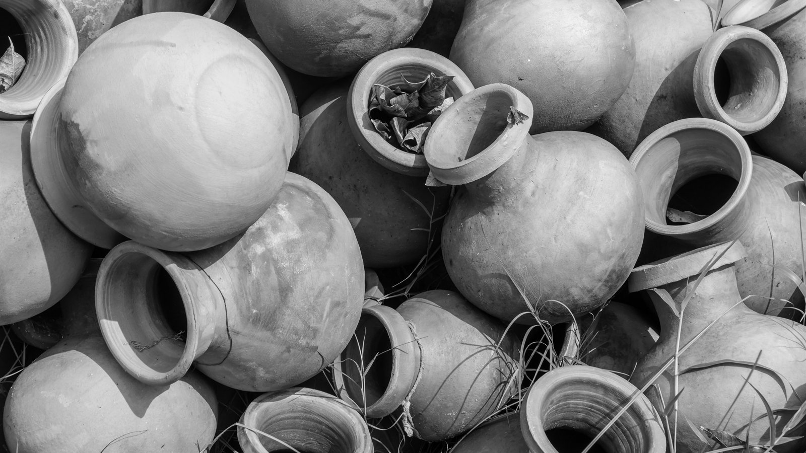 Row of unglazed clay pots