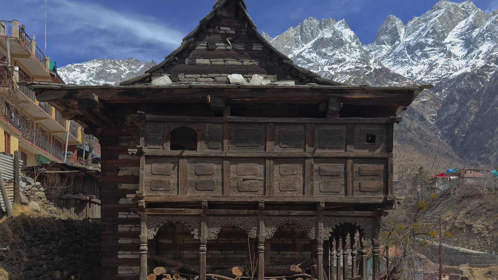 Traditional timber house with wide balconies in a mountain village