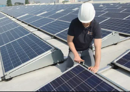 Solar installation specialists reviewing a home energy plan