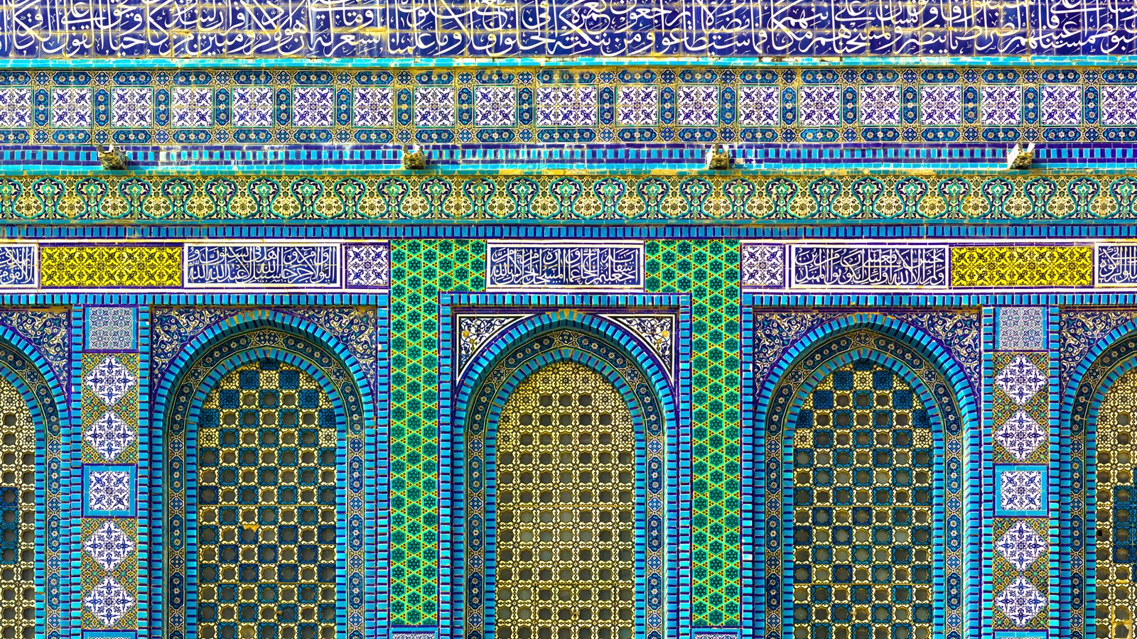 Ornate tiled dome interior with geometric patterns