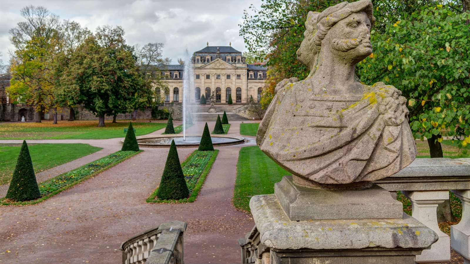 Formal palace garden with clipped beds and gravel paths