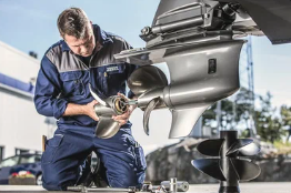 Marine technicians working on a yacht