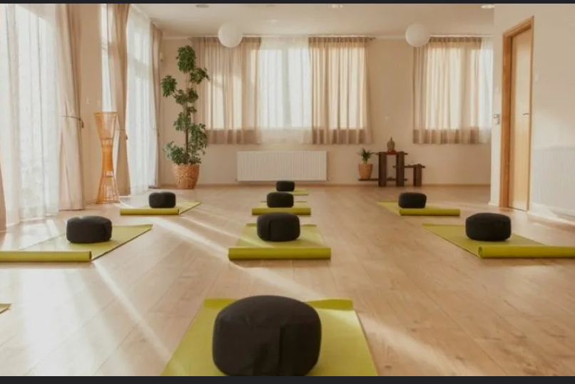 Students practicing yoga and meditation together